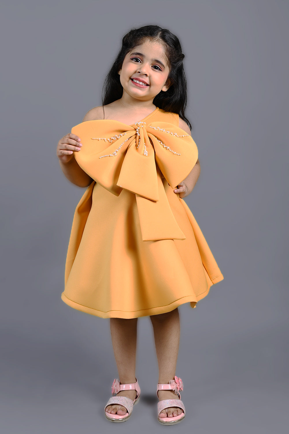 Mustard yellow one shoulder bow dress