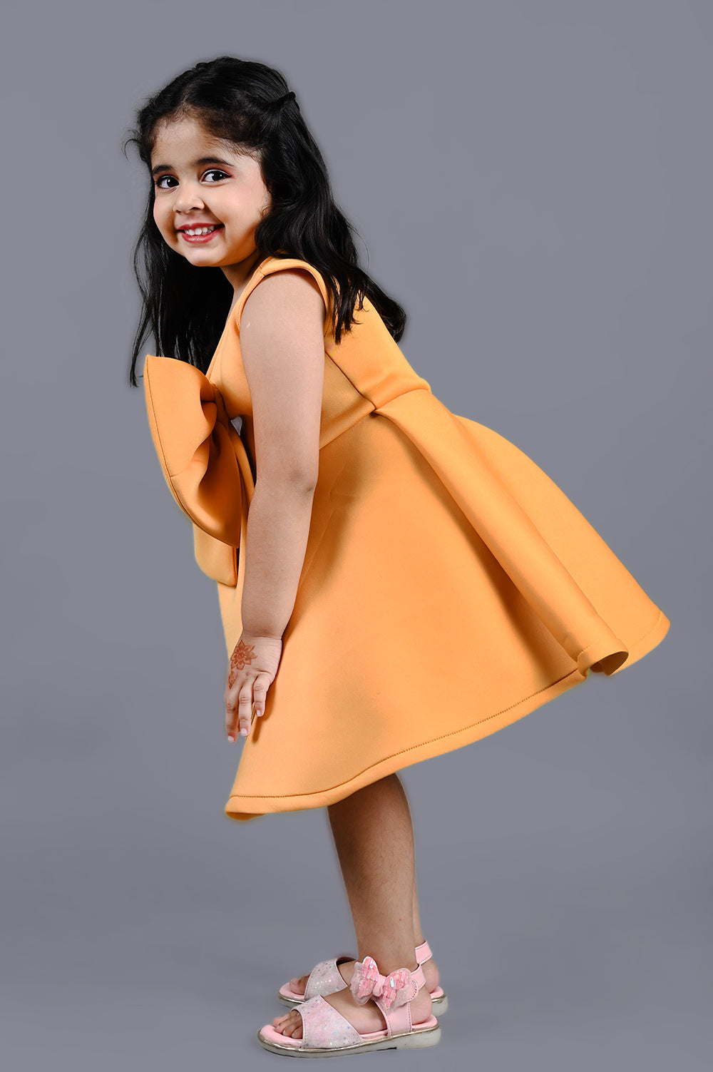 Mustard yellow one shoulder bow dress