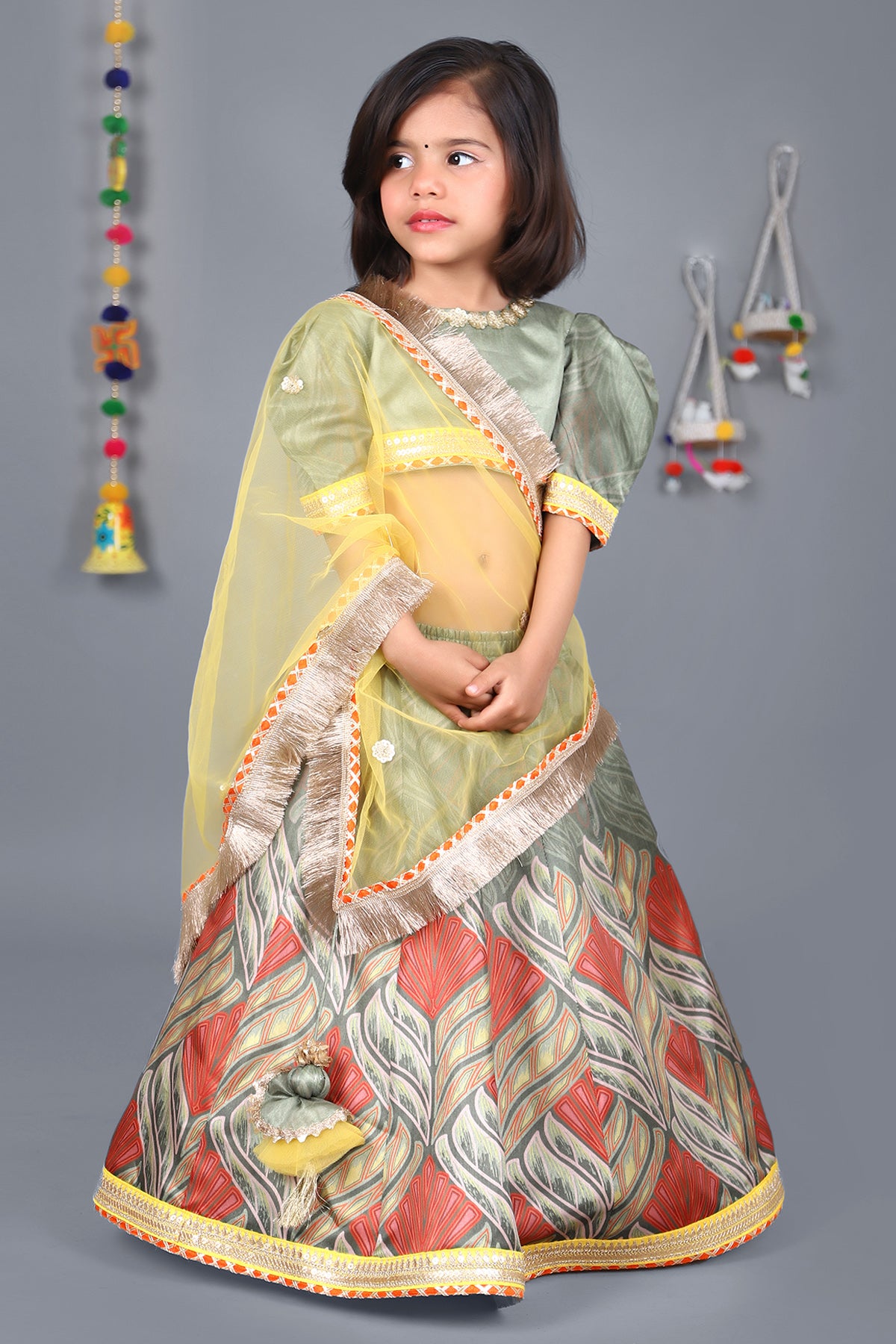 Green puff sleeve choli multicolour printed lehenga with yellow drape dupatta