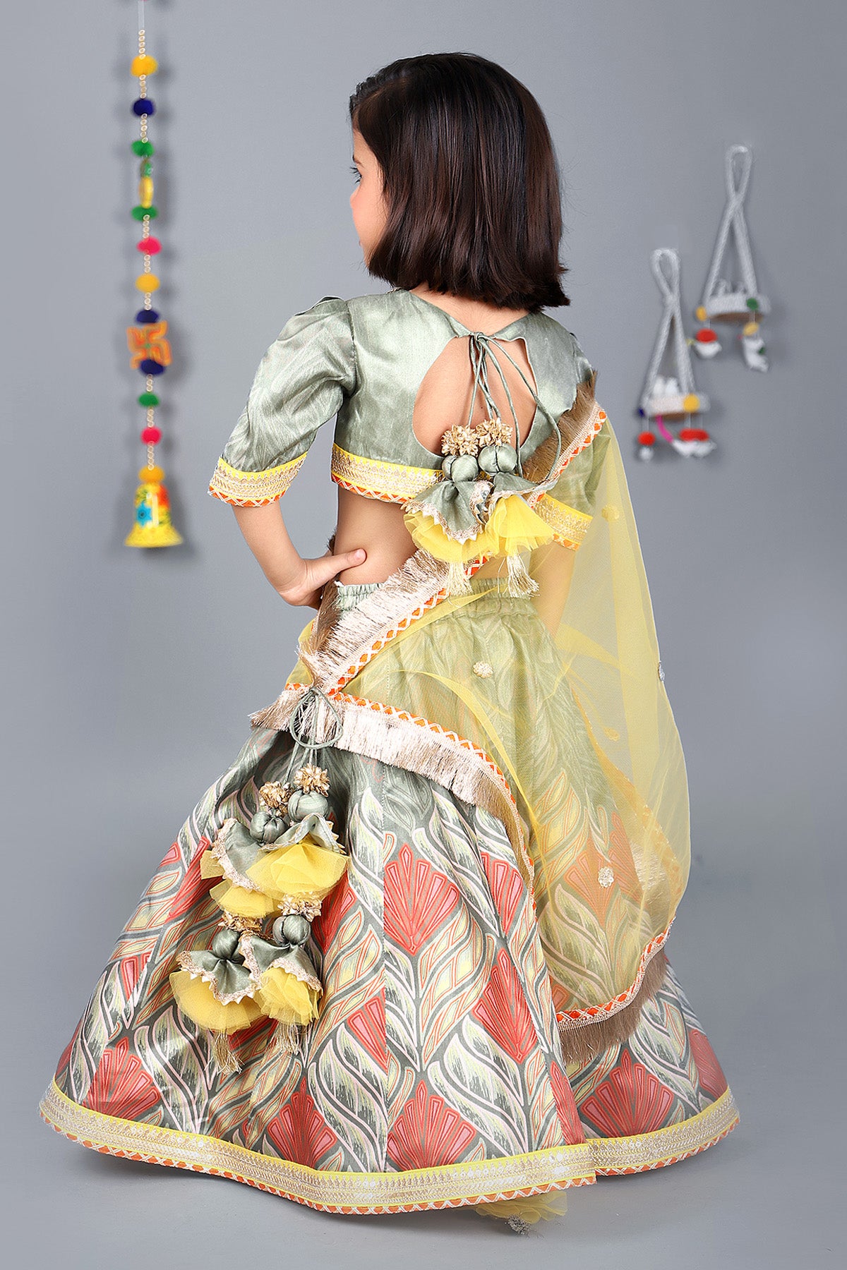 Green puff sleeve choli multicolour printed lehenga with yellow drape dupatta