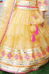 Yellow embroidered choli and lehenga with frilly dupatta